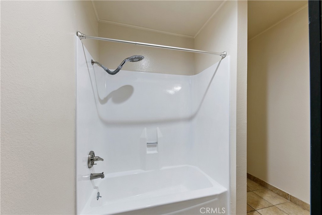 1517 East Garfield Avenue, Unit 53 Glendale, CA 91205 - Photo 28 of 53 a bathroom with a bathtub