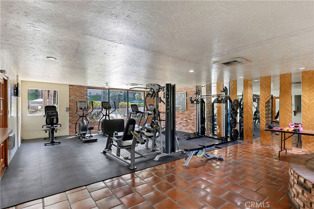 1517 East Garfield Avenue, Unit 53 Glendale, CA 91205 - Photo 37 of 53 a view of a room with gym equipment