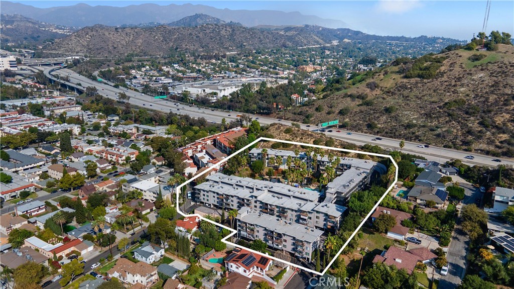 1517 East Garfield Avenue, Unit 53 Glendale, CA 91205 - Photo 47 of 53 an aerial view of a house with a yard