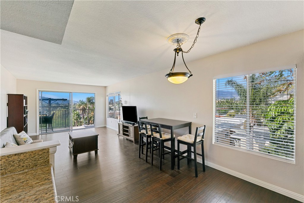 1517 East Garfield Avenue, Unit 53 Glendale, CA 91205 - Photo 9 of 53 a view of a livingroom with furniture window and wooden floor