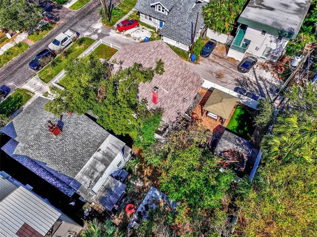 an aerial view of a house with a garden