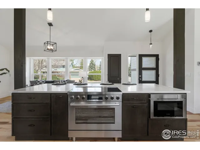 a kitchen with a stove and a sink