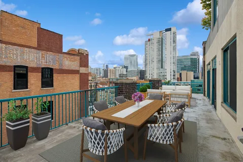 a view of a terrace with furniture