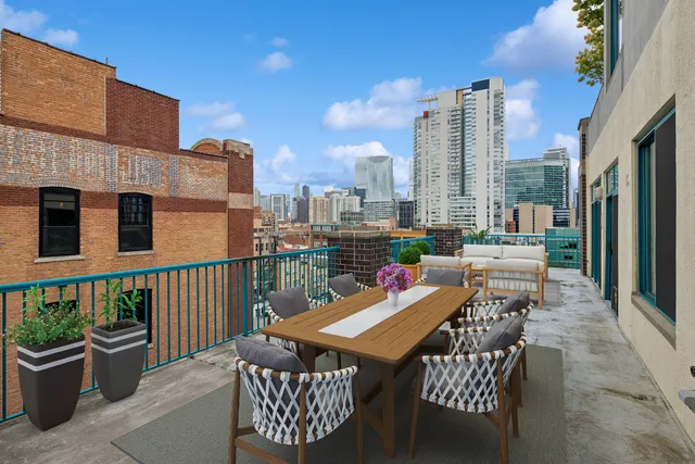 a view of a terrace with furniture