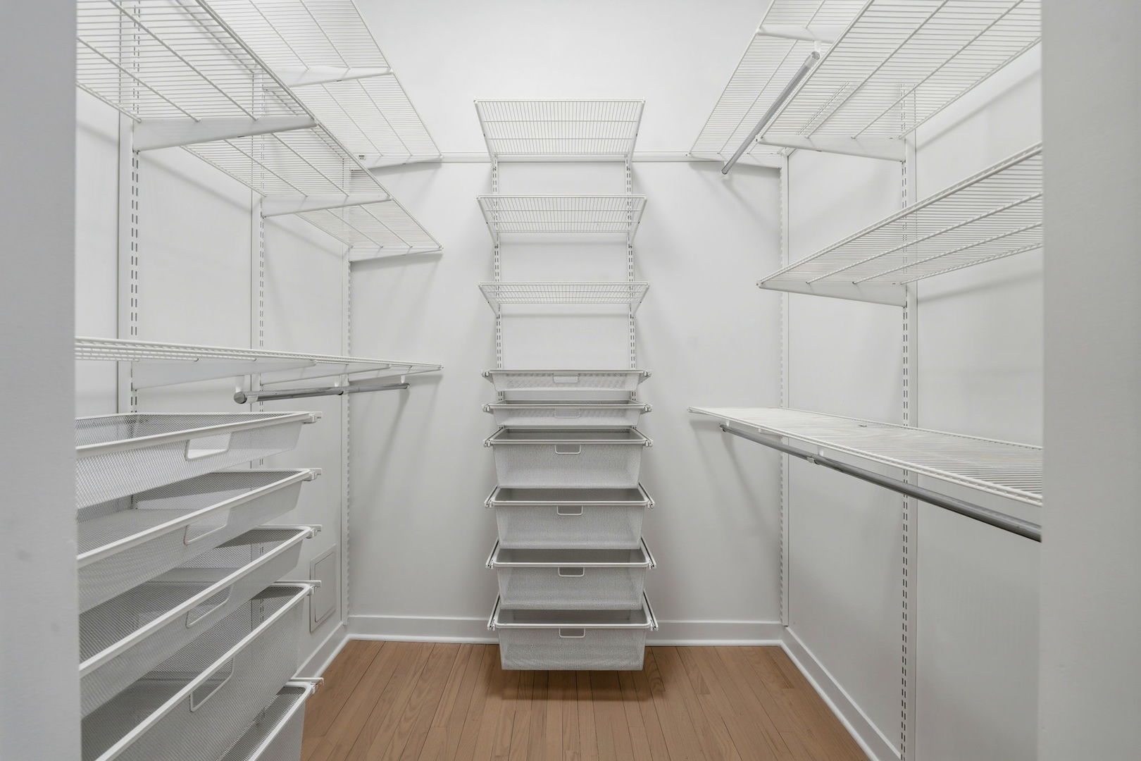 910 West Madison Street, Unit 808 Chicago, IL 60607 - Photo 20 of 37 a view of walk in closet with empty racks