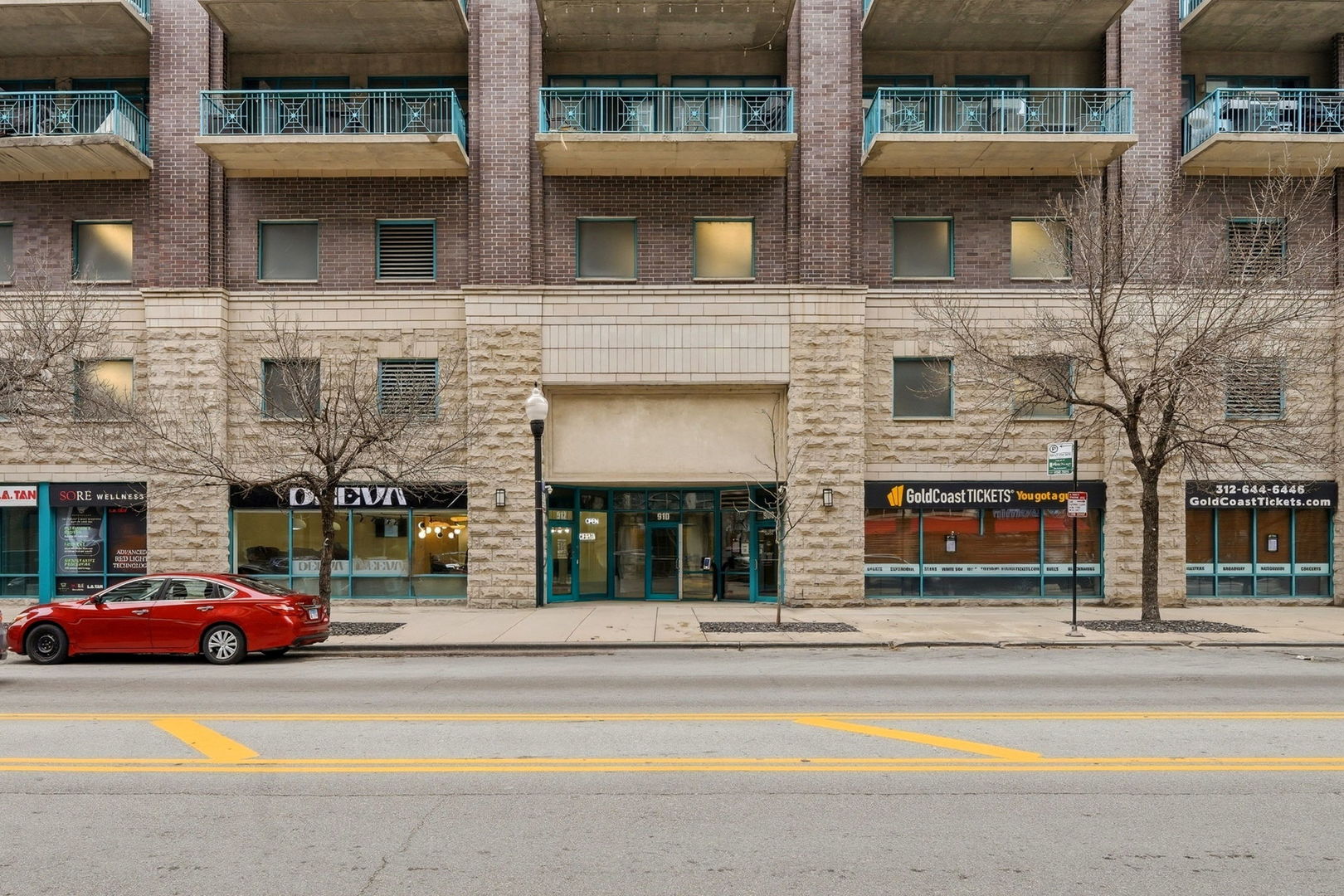 910 West Madison Street, Unit 808 Chicago, IL 60607 - Photo 2 of 37 a car parked in front of a building