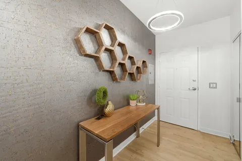 a room with a table and chairs