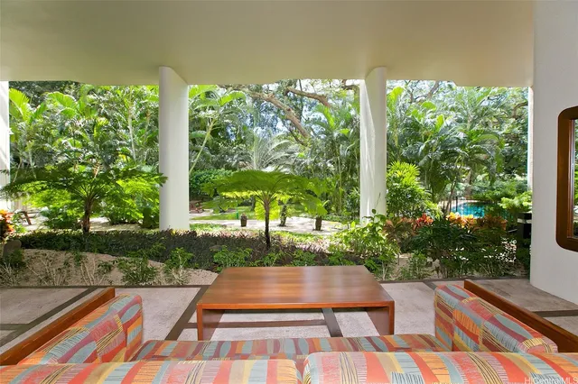 a view of swimming pool with a patio