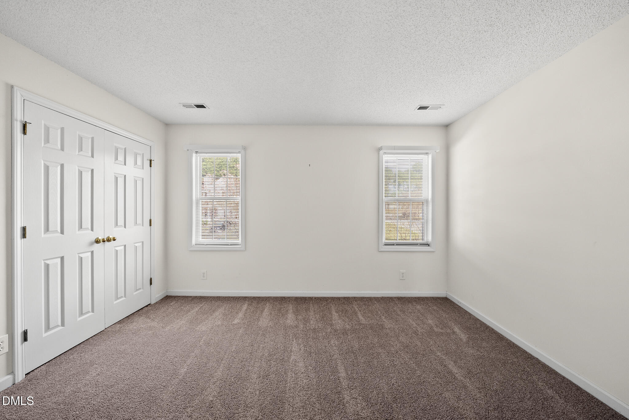 4126 Beaufain Street Raleigh, NC 27604 - Photo 20 of 36 an empty room with windows