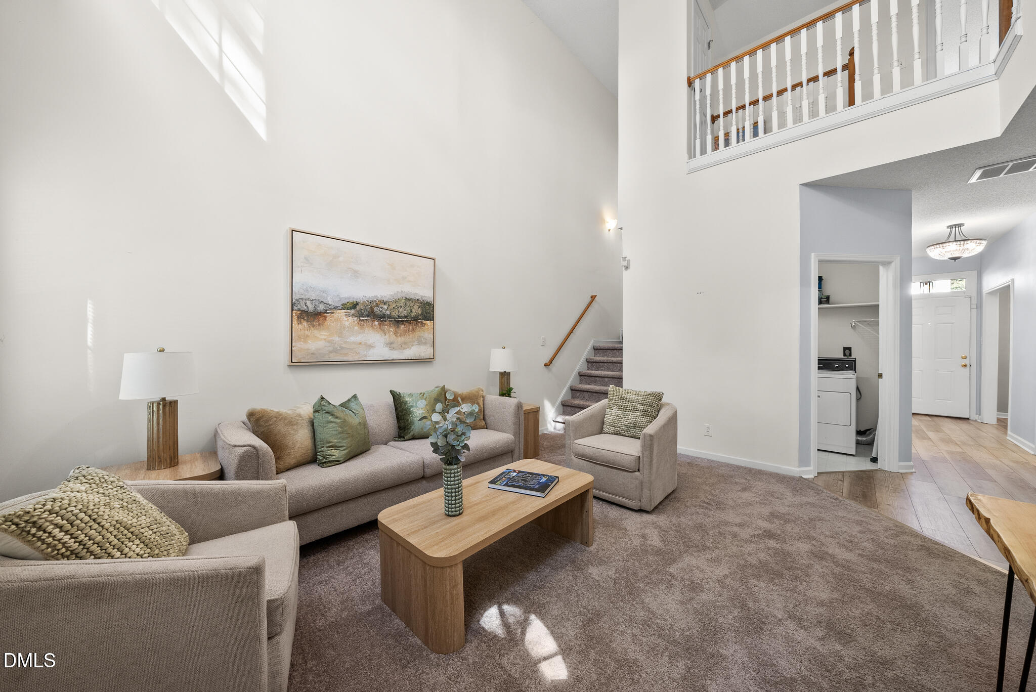 4126 Beaufain Street Raleigh, NC 27604 - Photo 21 of 36 a living room with furniture and a painting on the wall