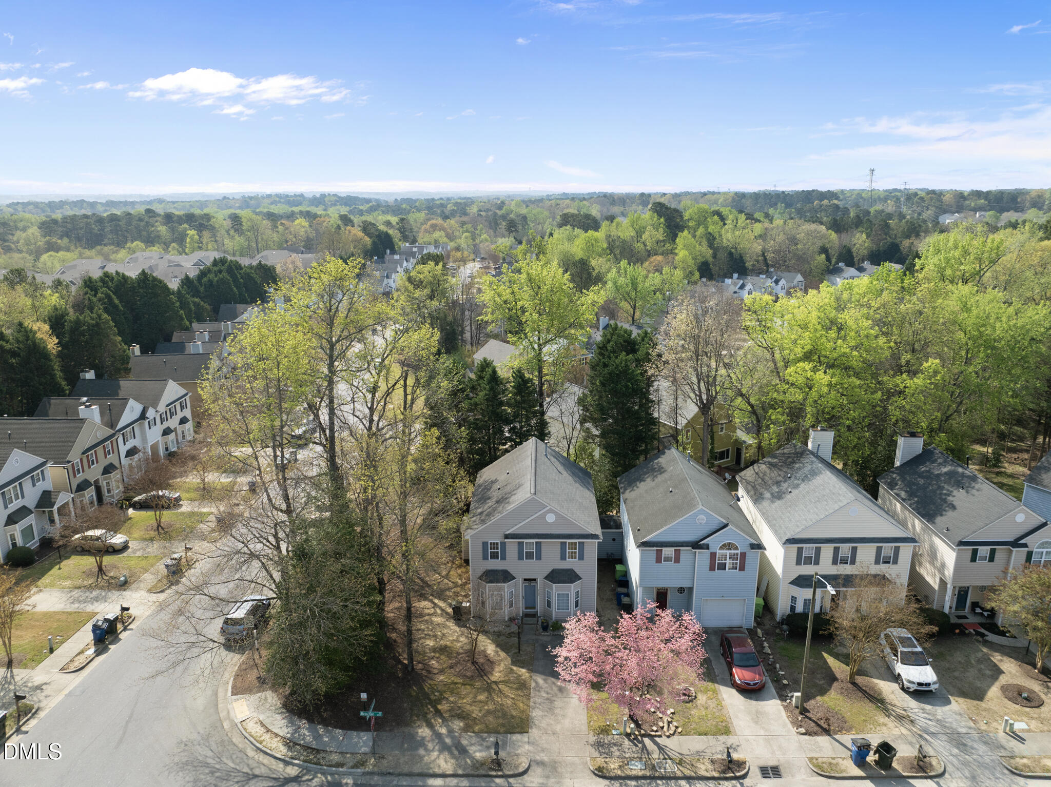 4126 Beaufain Street Raleigh, NC 27604 - Photo 24 of 36 a front view of a house with a yard and lake view
