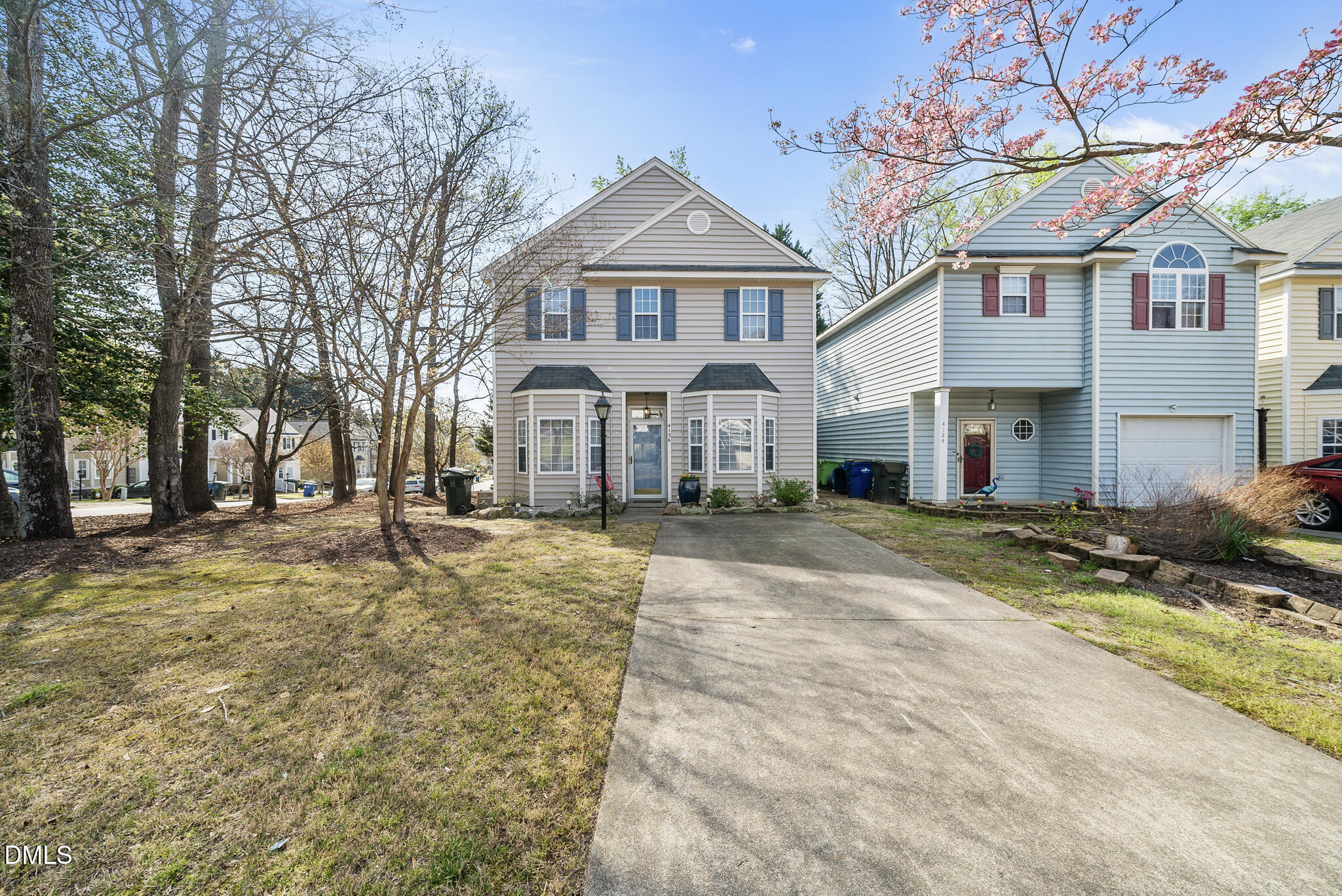 4126 Beaufain Street Raleigh, NC 27604 - Photo 27 of 36 a front view of a residential houses with yard