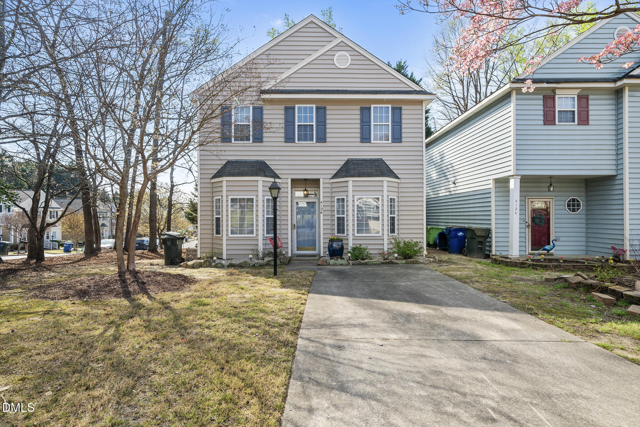 4126 Beaufain Street Raleigh, NC 27604 - Photo 28 of 36 a front view of a house with a yard
