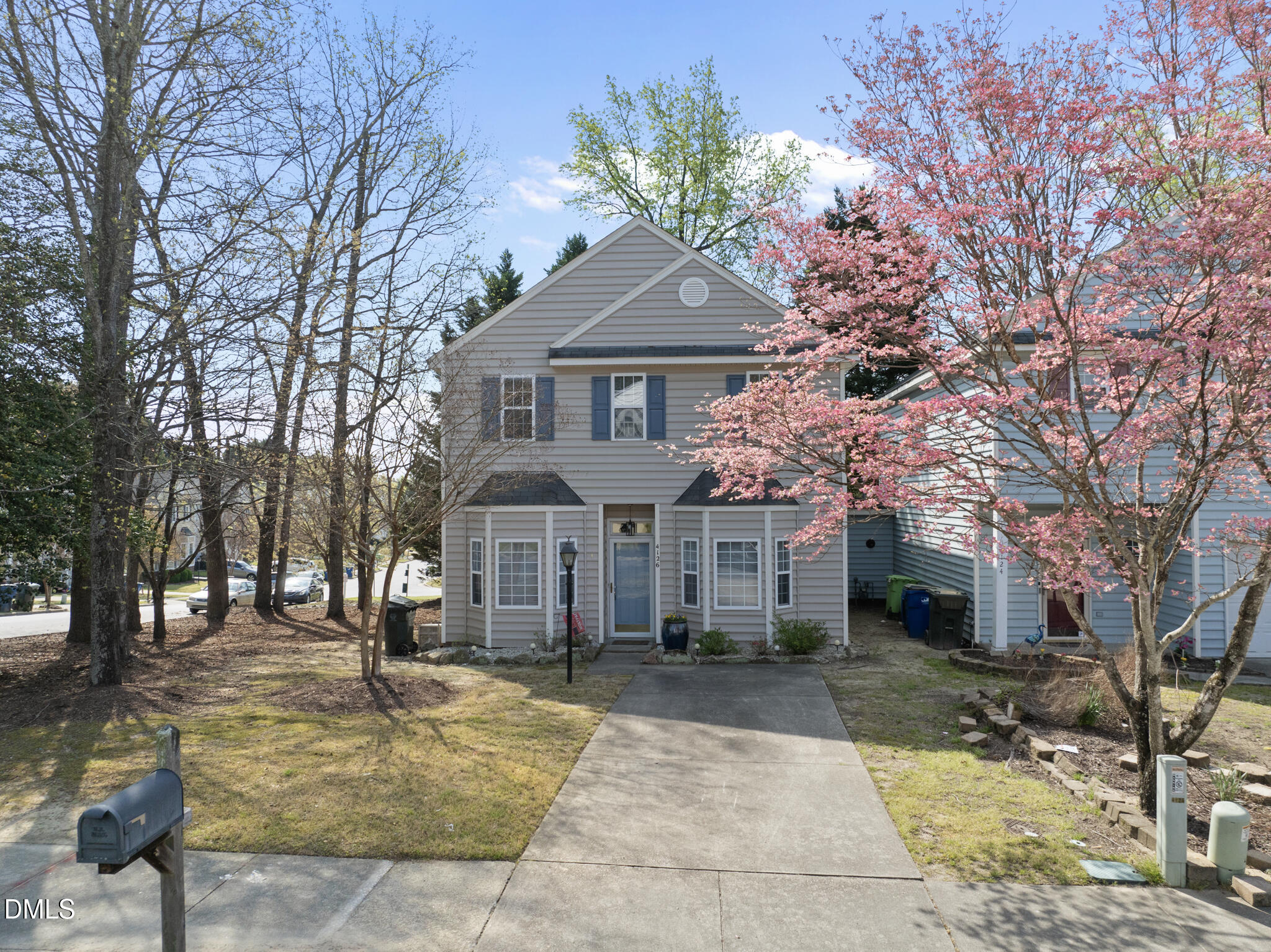 4126 Beaufain Street Raleigh, NC 27604 - Photo 30 of 36 a front view of a house with a yard