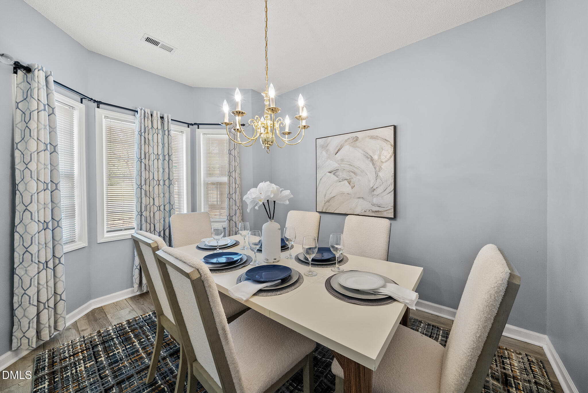 4126 Beaufain Street Raleigh, NC 27604 - Photo 3 of 36 a view of a dining room with furniture window and outside view