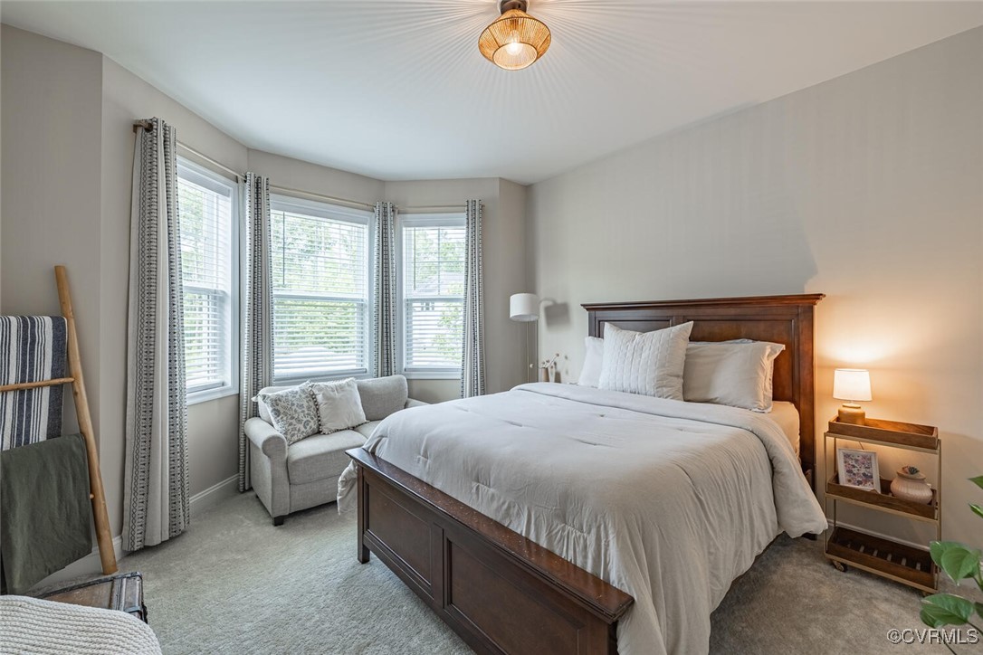 15813 Maclear Drive Midlothian, VA 23112 - Photo 20 of 38 a bedroom with a bed and a couch