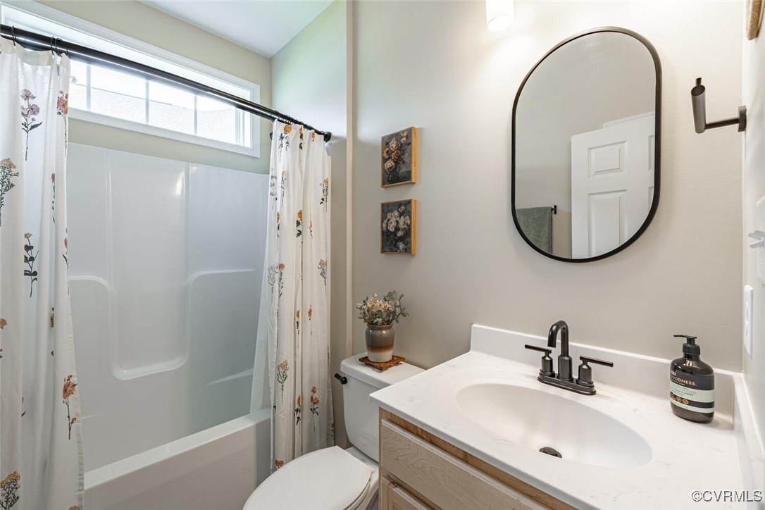 15813 Maclear Drive Midlothian, VA 23112 - Photo 21 of 38 a bathroom with a sink toilet and shower