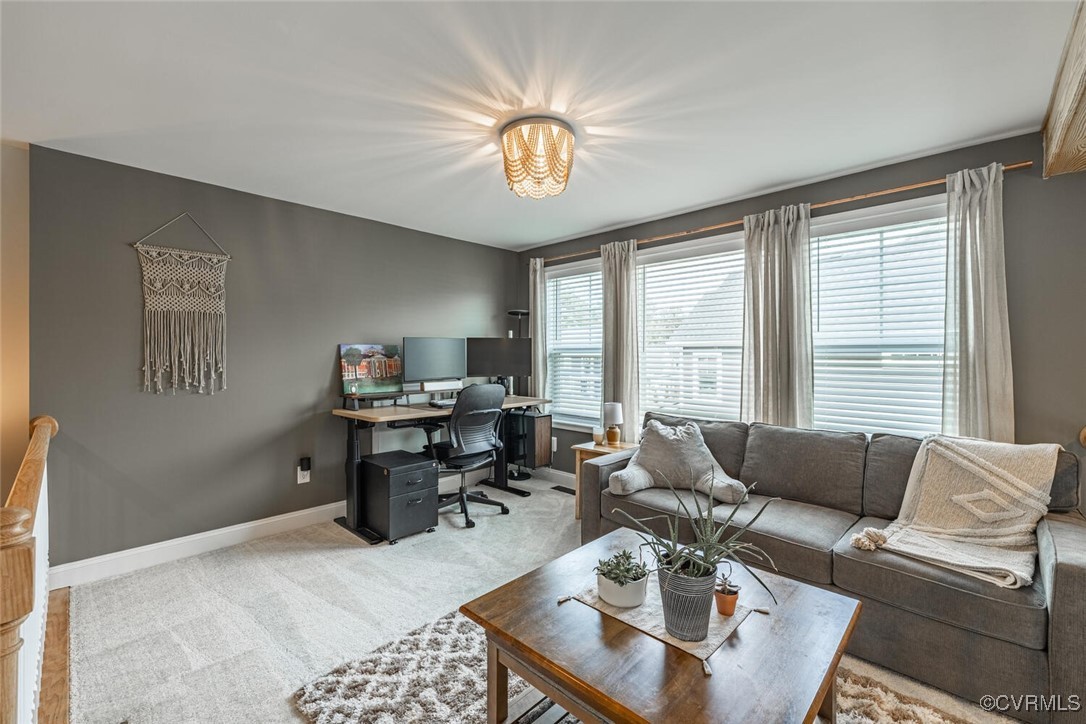 15813 Maclear Drive Midlothian, VA 23112 - Photo 25 of 38 a living room with furniture a desk and a window
