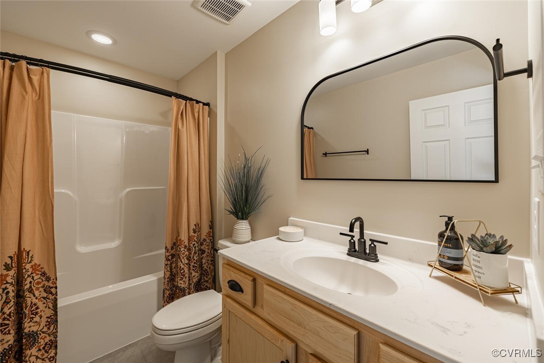 15813 Maclear Drive Midlothian, VA 23112 - Photo 30 of 38 a bathroom with a sink a toilet and shower