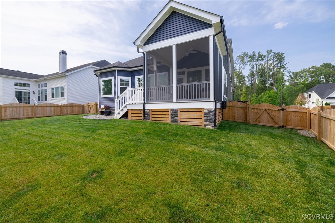 15813 Maclear Drive Midlothian, VA 23112 - Photo 36 of 38 a front view of a house with a yard and trees