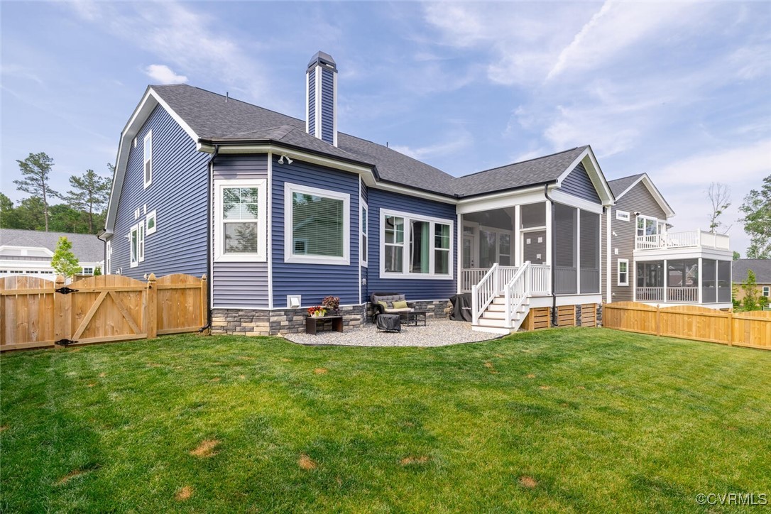 15813 Maclear Drive Midlothian, VA 23112 - Photo 37 of 38 a front view of a house with patio and yard