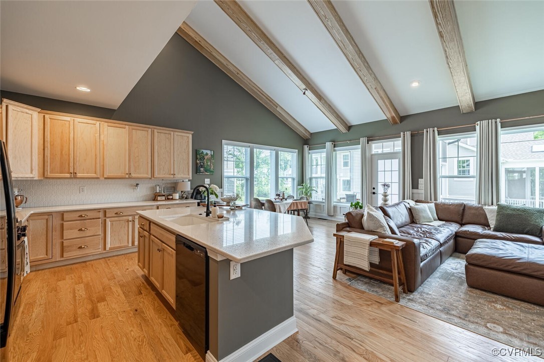 15813 Maclear Drive Midlothian, VA 23112 - Photo 7 of 38 a large white kitchen with a large window a sink and counter space