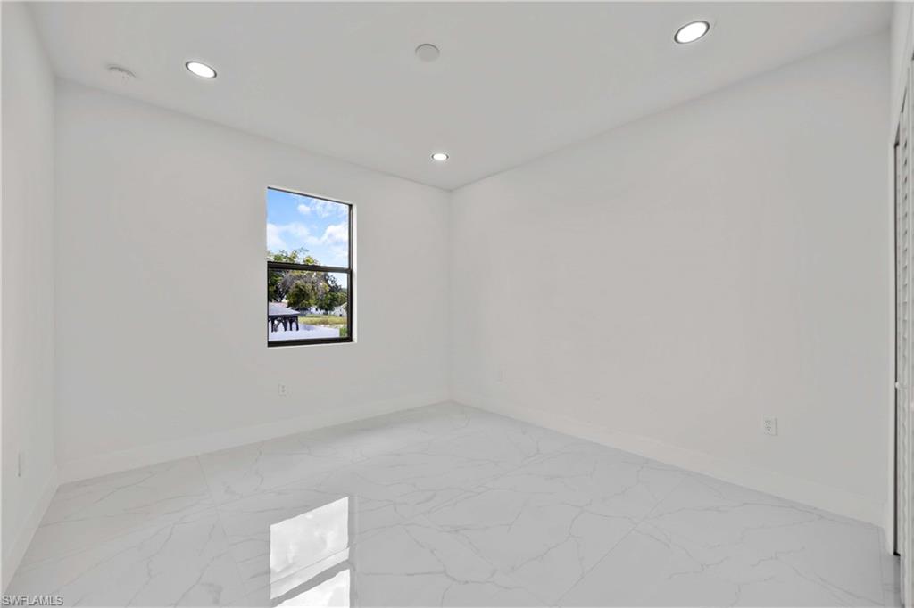 228 Connecticut Road Lehigh Acres, FL 33936 - Photo 14 of 21 a view of an empty room