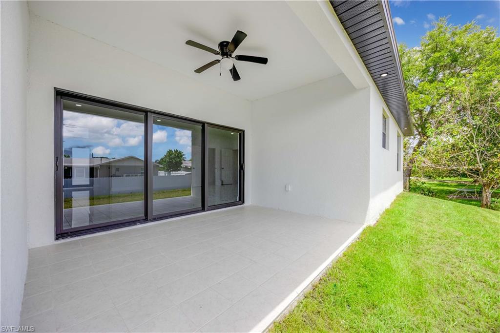 228 Connecticut Road Lehigh Acres, FL 33936 - Photo 19 of 21 a view of swimming pool from a balcony