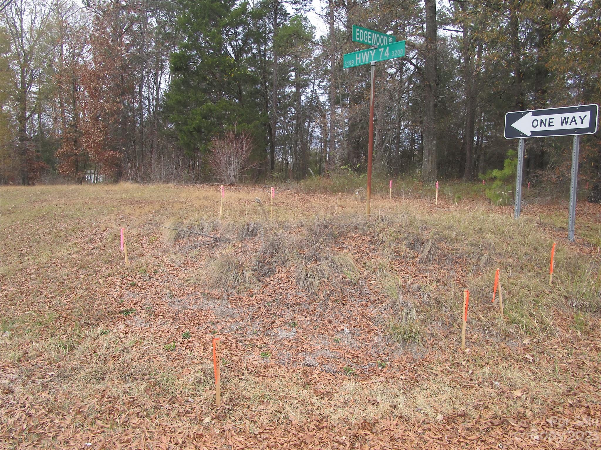 3508 Highway 74 Monroe, NC 28112 - Photo 14 of 28 a backyard of a house with lots of green space