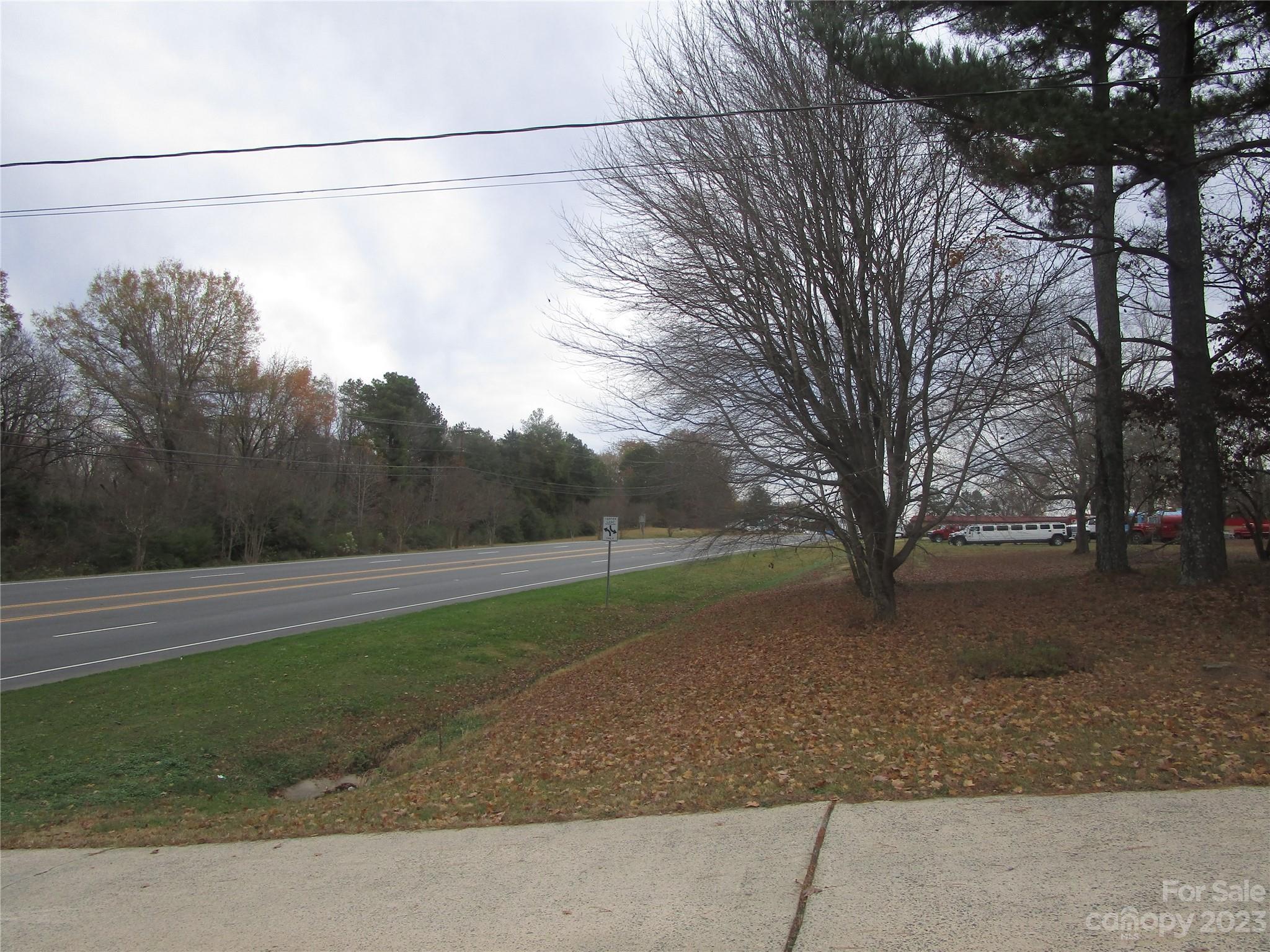 3508 Highway 74 Monroe, NC 28112 - Photo 19 of 28 a backyard of a house with lots of green space