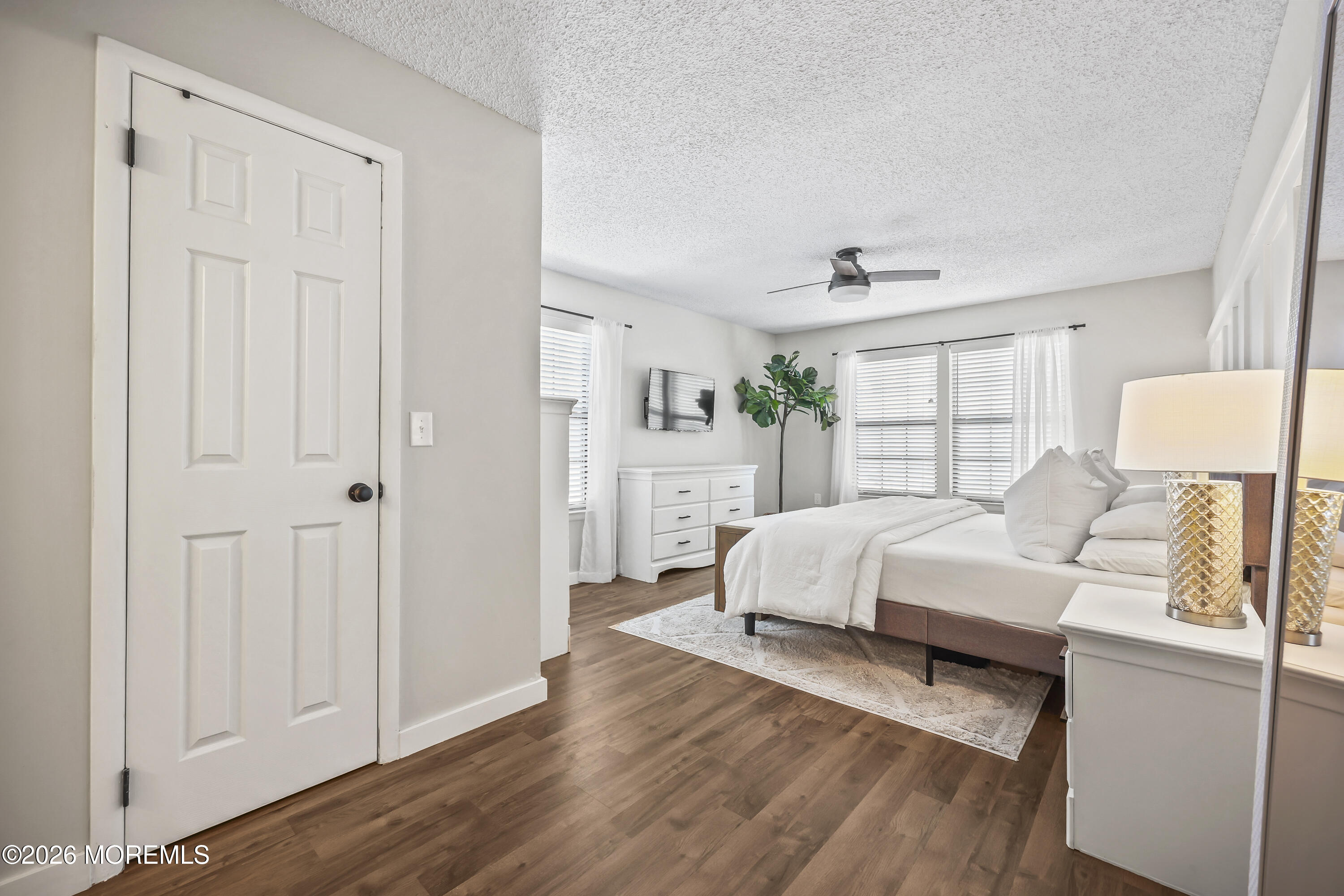 710 Ivy Court Jackson, NJ 08527 - Photo 11 of 21 a spacious bedroom with a bed and a window