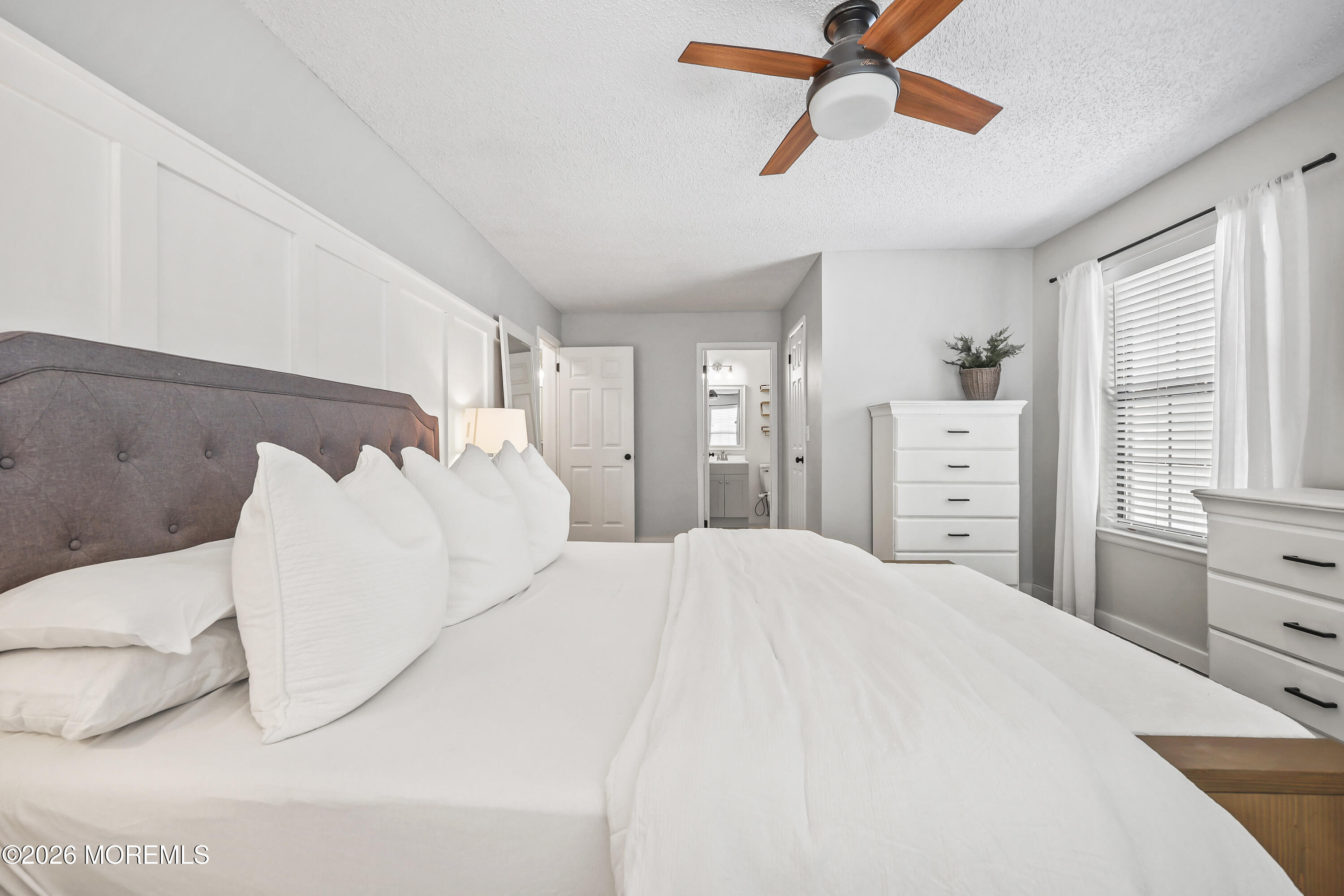 710 Ivy Court Jackson, NJ 08527 - Photo 15 of 21 a large white bed in a white room