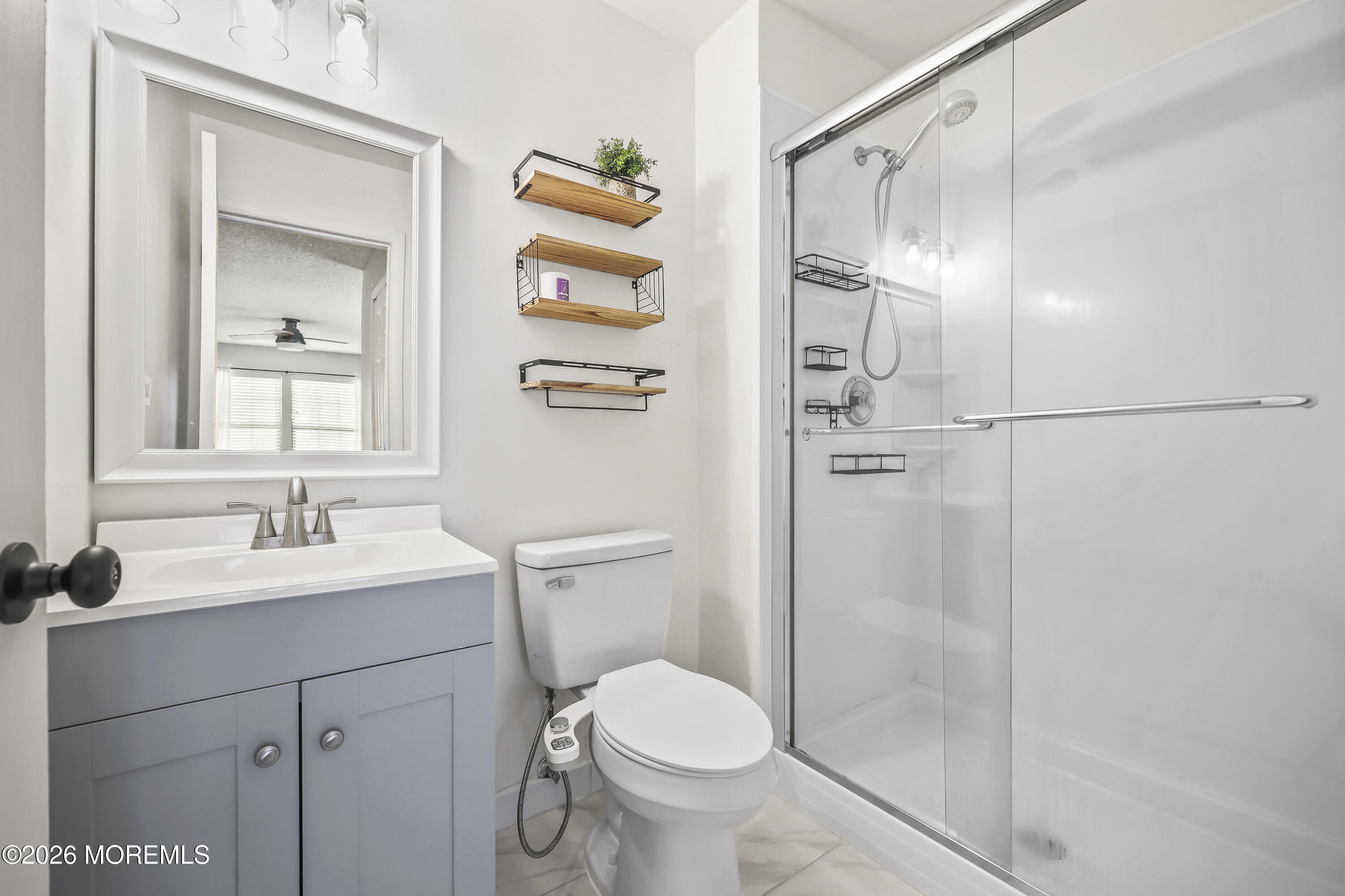 710 Ivy Court Jackson, NJ 08527 - Photo 16 of 21 a bathroom with a sink toilet and shower