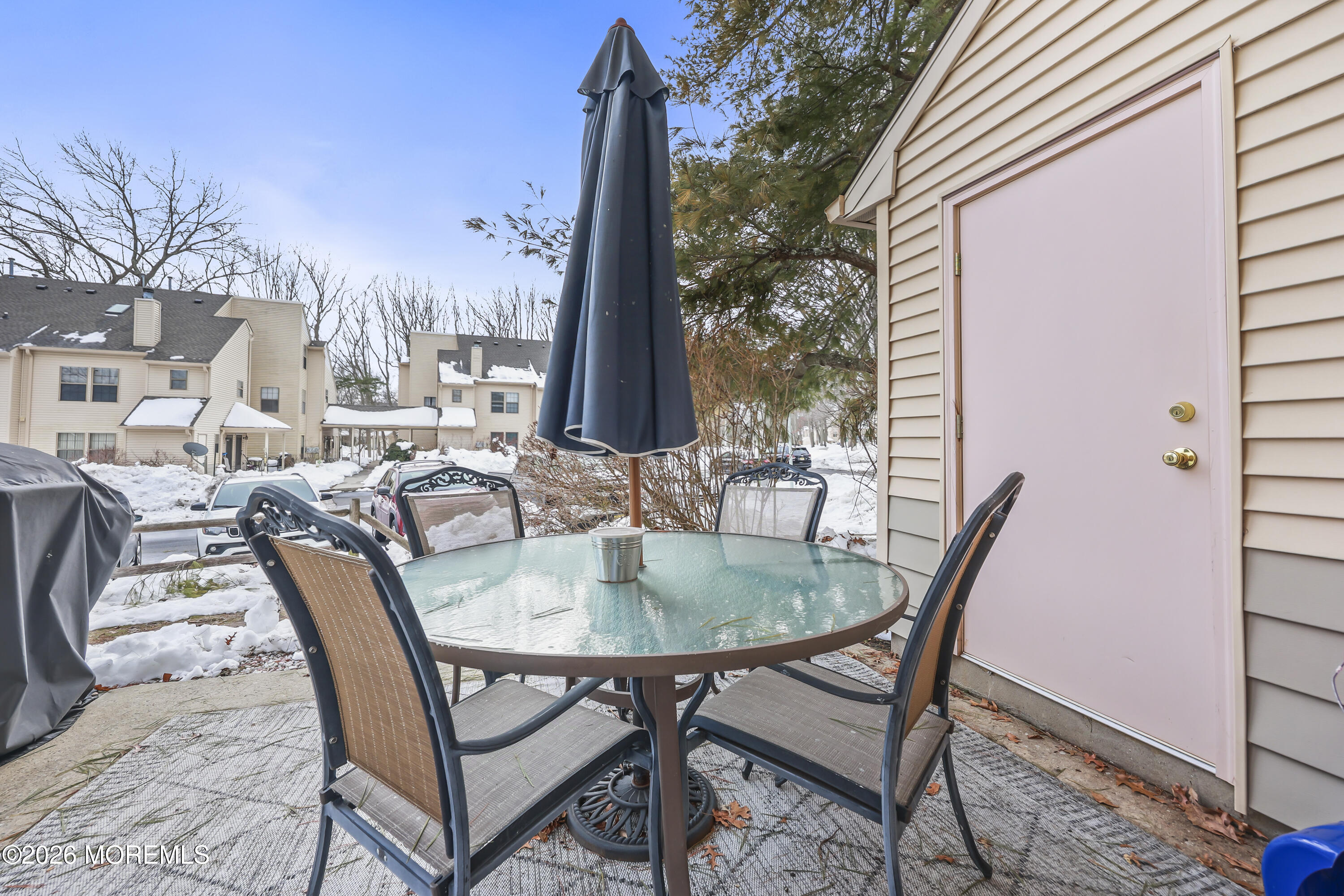 710 Ivy Court Jackson, NJ 08527 - Photo 21 of 21 a outdoor dining space with furniture and wooden floor