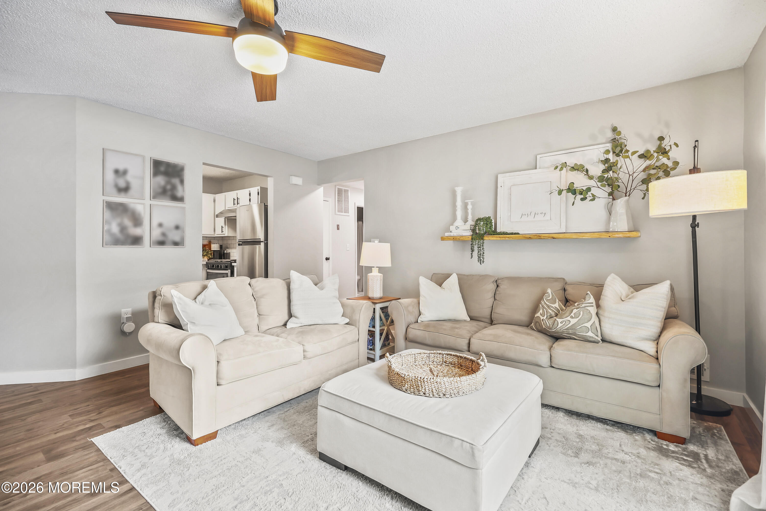 710 Ivy Court Jackson, NJ 08527 - Photo 7 of 21 a living room with furniture and a white walls