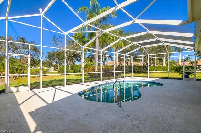 a view of a swimming pool with outdoor space