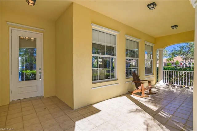 a view of a house with a lounge chair