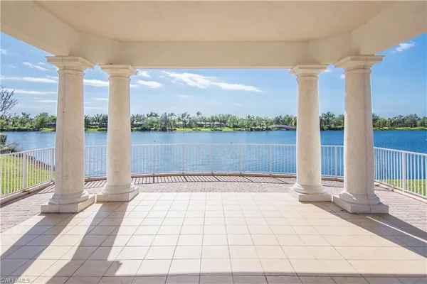 a front view of a house with a lake view