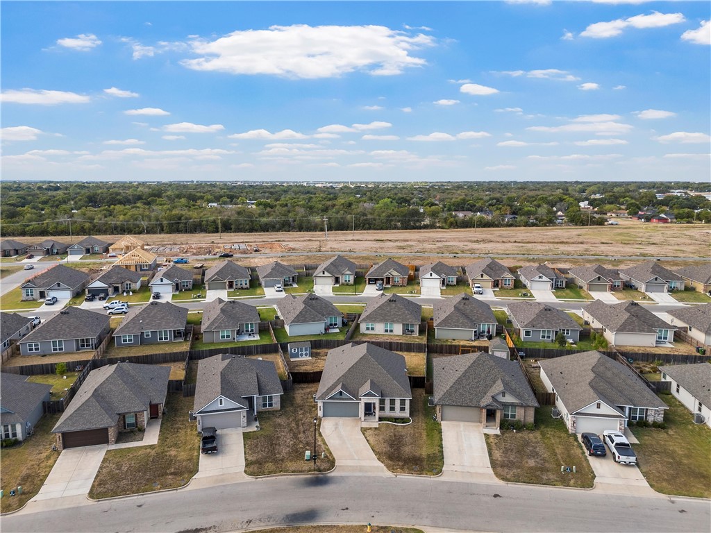 4016 Bravo Ranch Road Waco, TX 76705 - Photo 32 of 38 an aerial view of a house with a ocean view