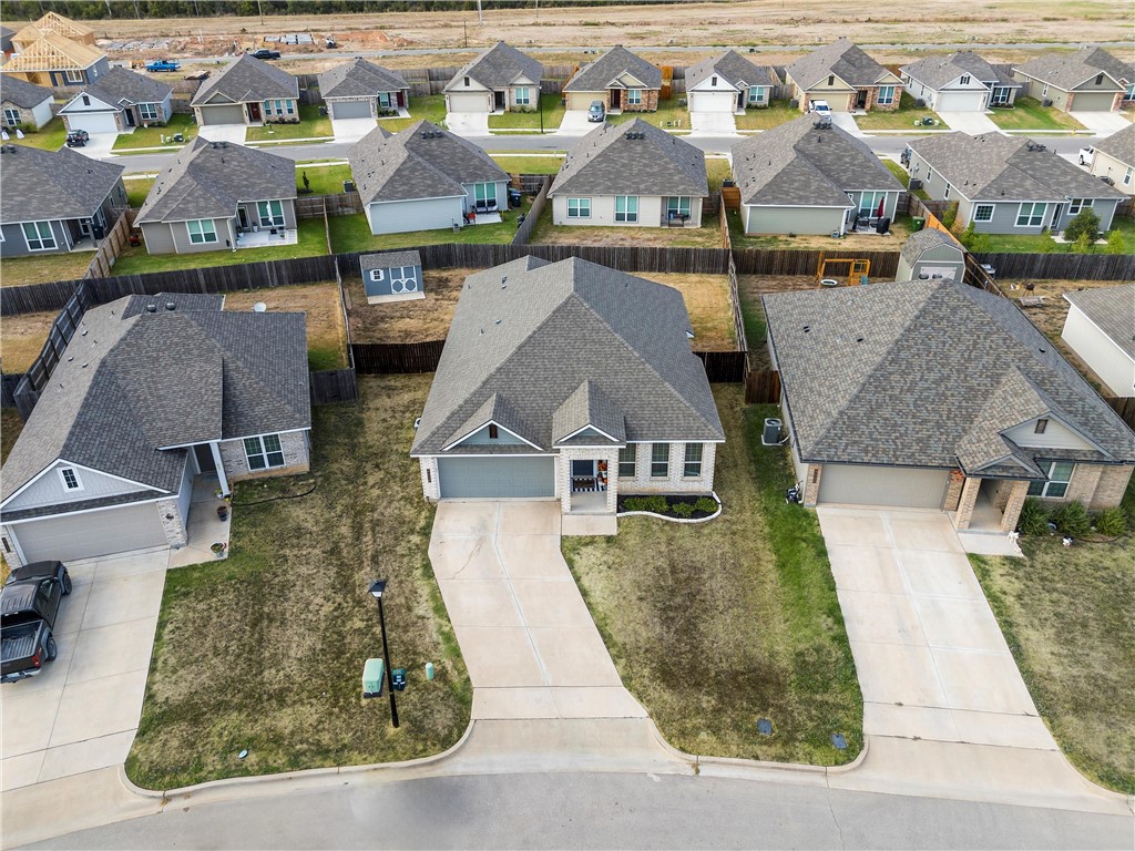 4016 Bravo Ranch Road Waco, TX 76705 - Photo 36 of 38 an aerial view of a house with a swimming pool