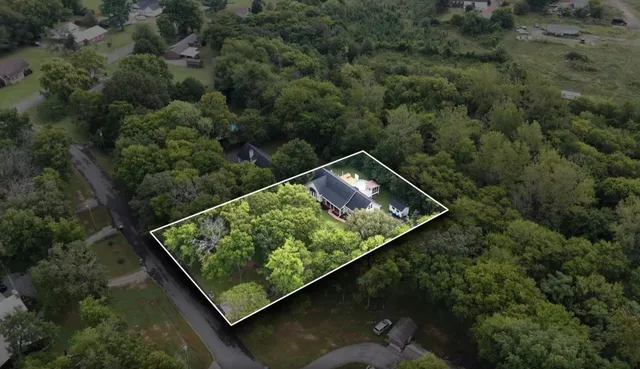 front view of a house with a garden