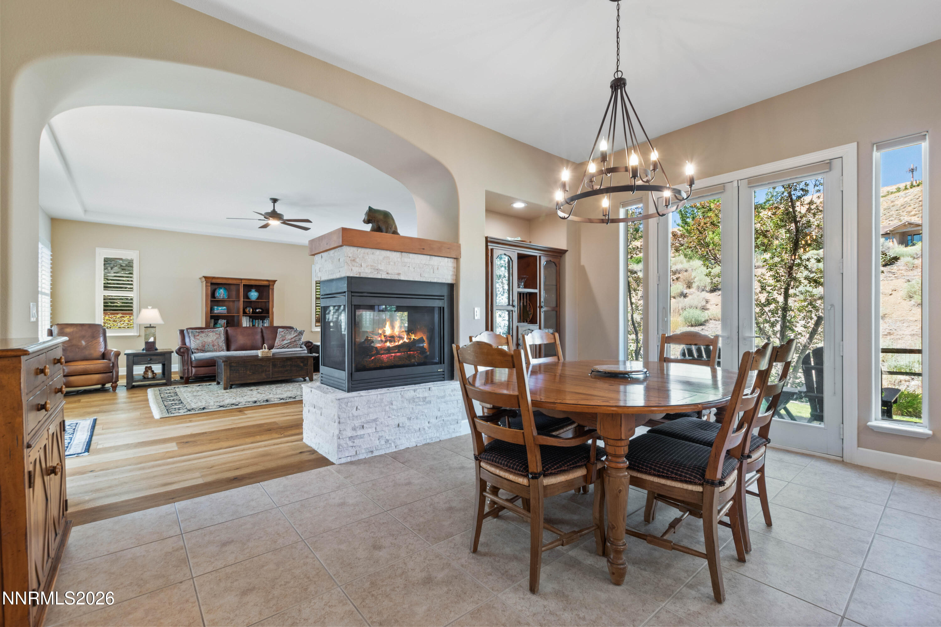 2395 Ridge Field Trail Reno, NV 89523 - Photo 13 of 44 a view of a dining room with furniture window and wooden floor