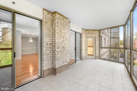 a view of an empty room and window