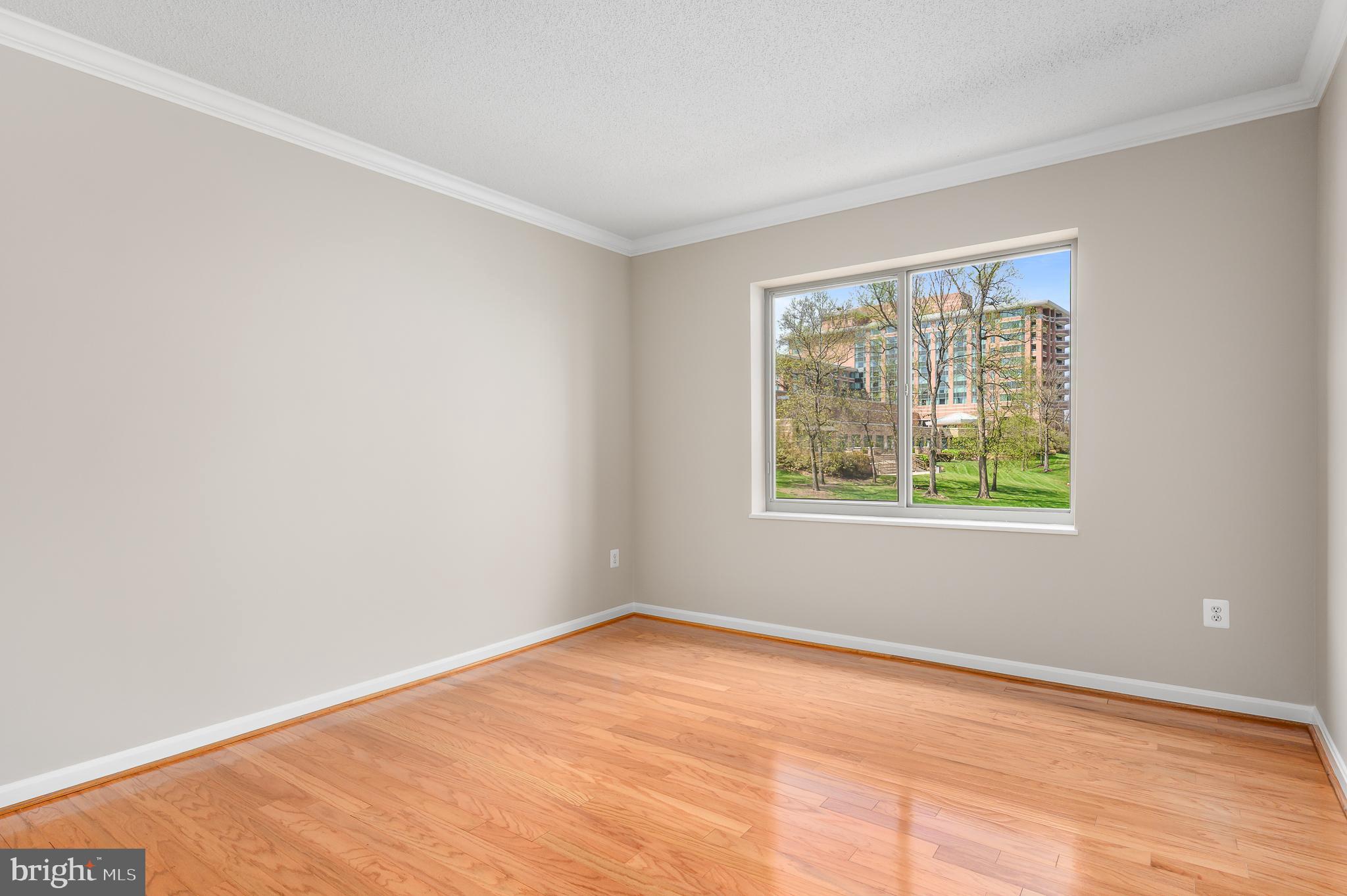 19355 Cypress Ridge Terrace, Unit 219 Leesburg, VA 20176 - Photo 22 of 42 a view of an empty room with a window