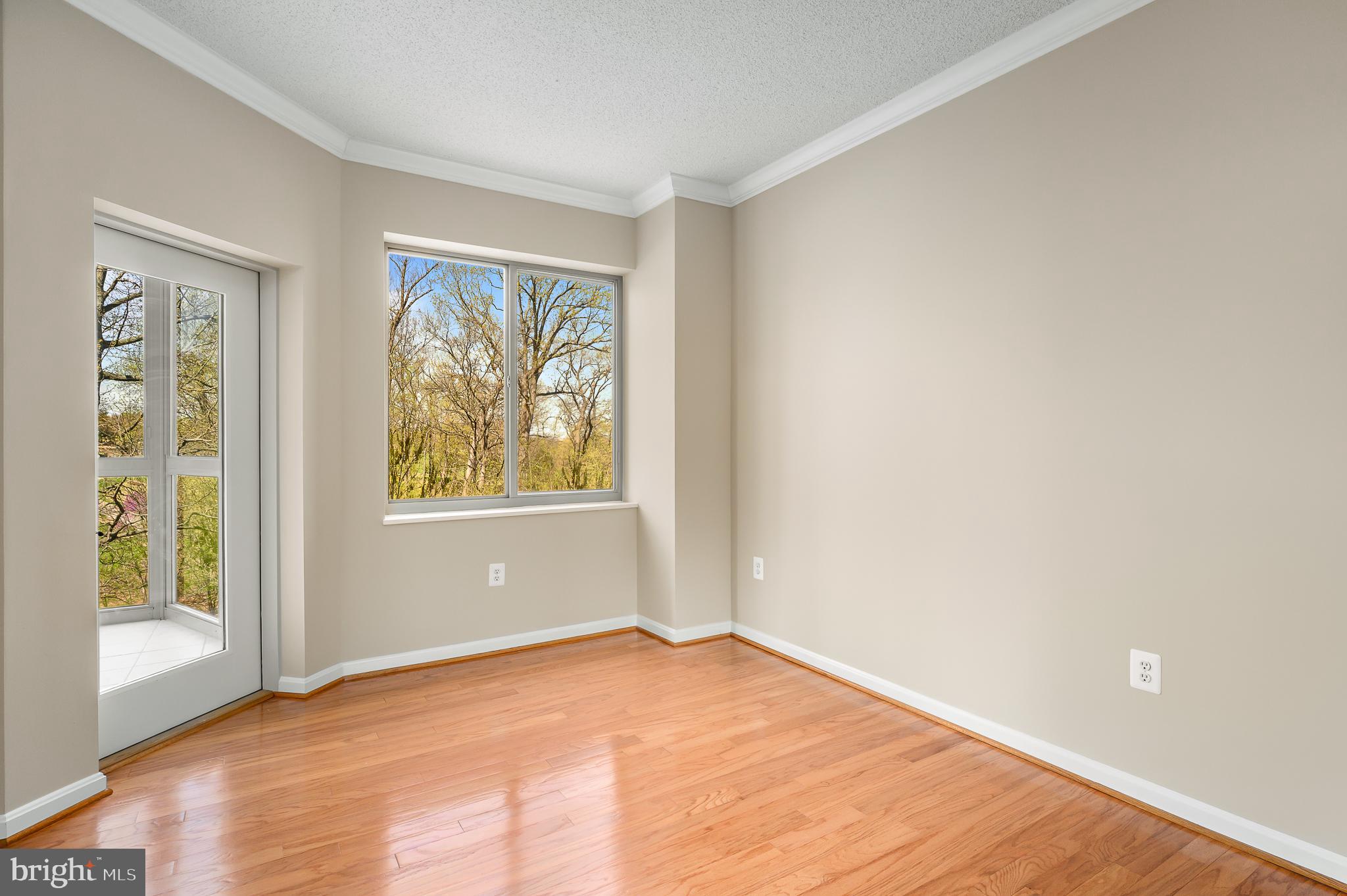 19355 Cypress Ridge Terrace, Unit 219 Leesburg, VA 20176 - Photo 27 of 42 a view of an empty room with a window