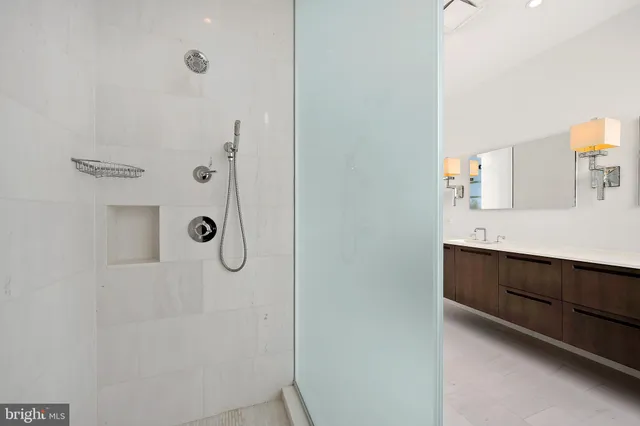 a kitchen with stainless steel appliances and a sink