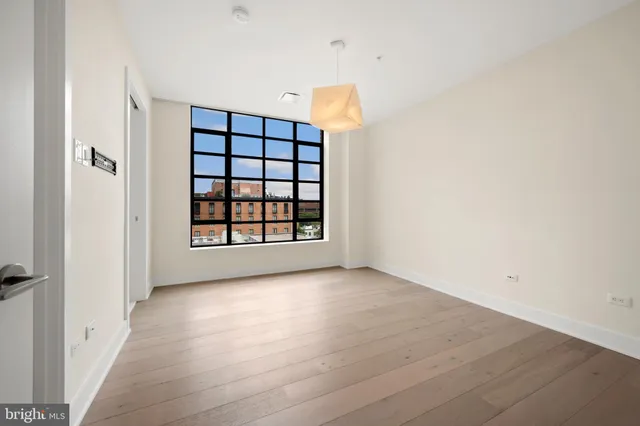 an empty room with windows