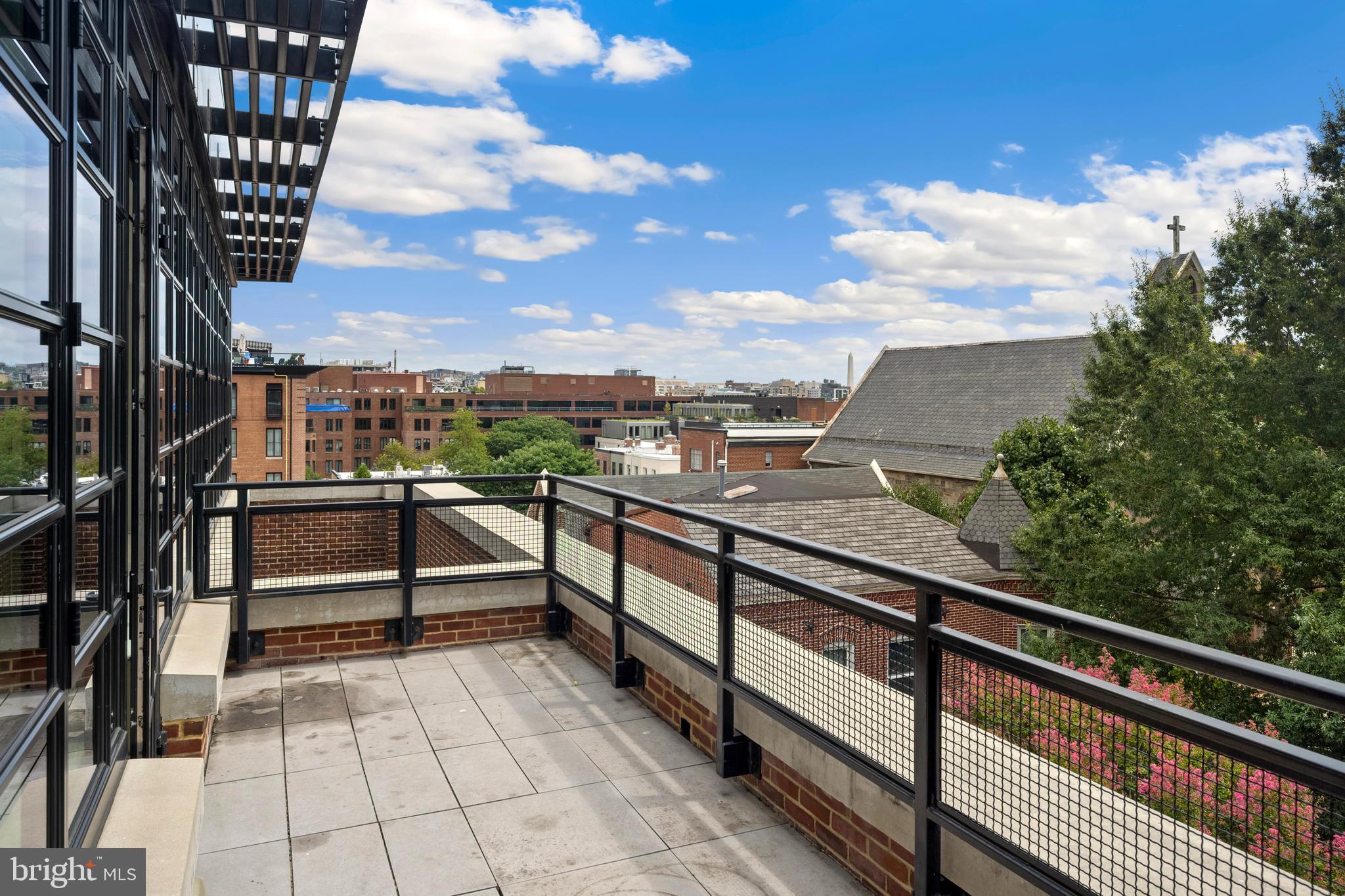 1055 Wisconsin Avenue Northwest, Unit 4E Washington, DC 20007 - Photo 42 of 58 a view of city from balcony