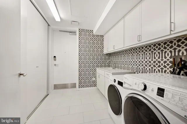 a view of an empty room with windows