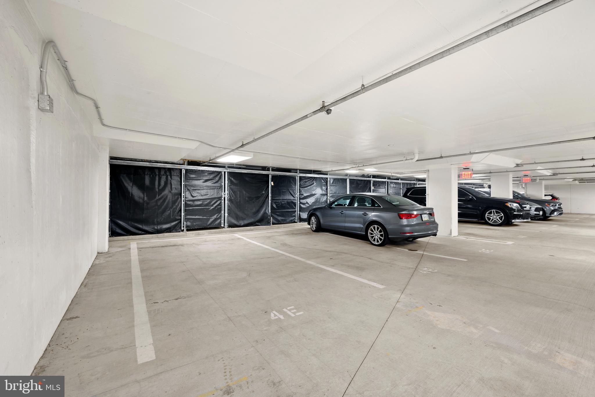 1055 Wisconsin Avenue Northwest, Unit 4E Washington, DC 20007 - Photo 45 of 58 a view of parking space with parked cars